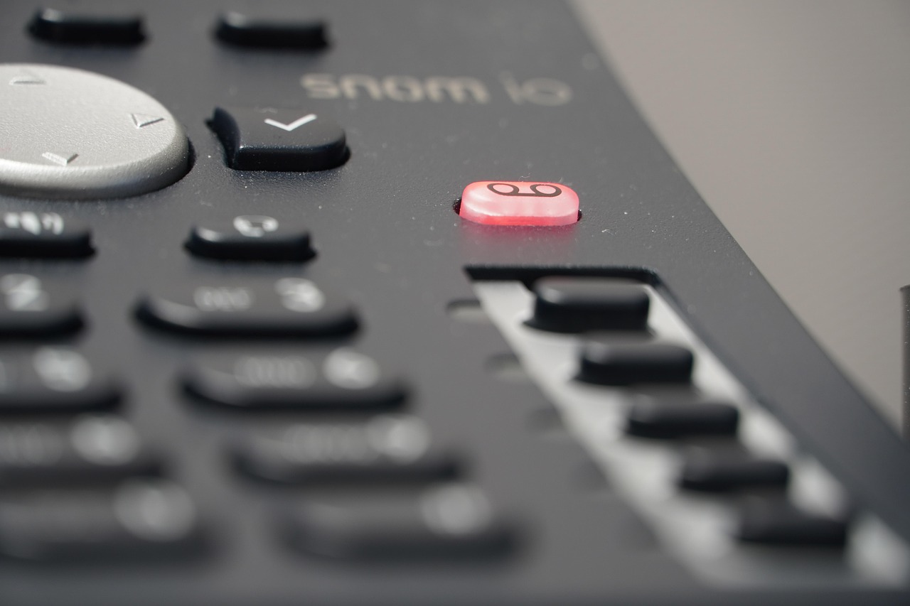 Business desk phone on an office desk after a cloud phone system cutover